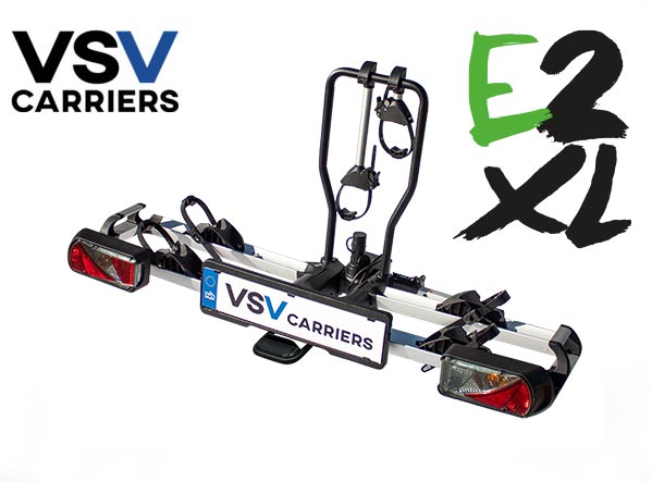 VSV E2 XL - <b>Adatto per monovolumi e furgoni con grande portellone posteriore.</b><br />
Capacit 2 bici anche e-BIKE (+ 1 bici optional cod. BCVSVEXT3ZX). Carico Max 60 Kg. Peso articolo 17 Kg.  in acciaio e alluminio. Portabici pieghevole.  Funzione reclinabile per l'apertura del bagagliaio. Passo bici: qualsiasi misura fino a 1350 mm.<br />Presa 7/13 poli- SPECIALE CON SUPPORTI RUOTA MAGGIORATI<br />
<b>ATTENZIONE:</b> lapertura del portellone  garantita quando le bici sono caricate sul portabici.